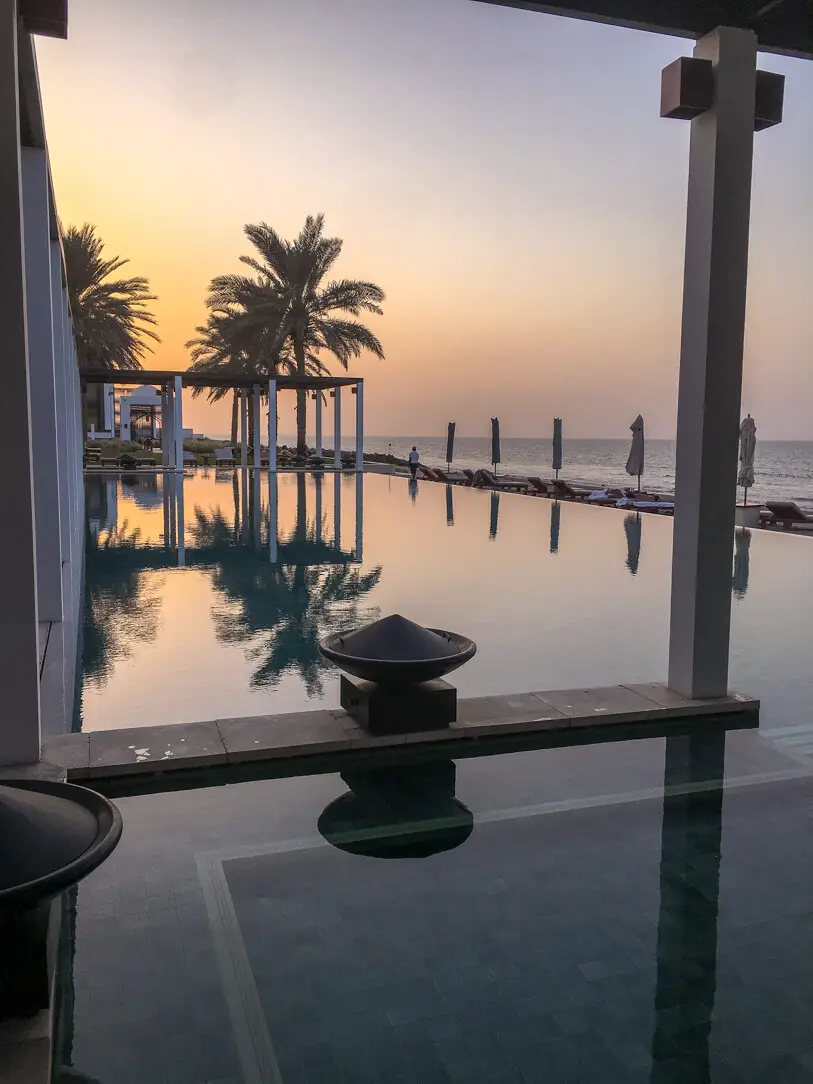The Chedi pool at sunset