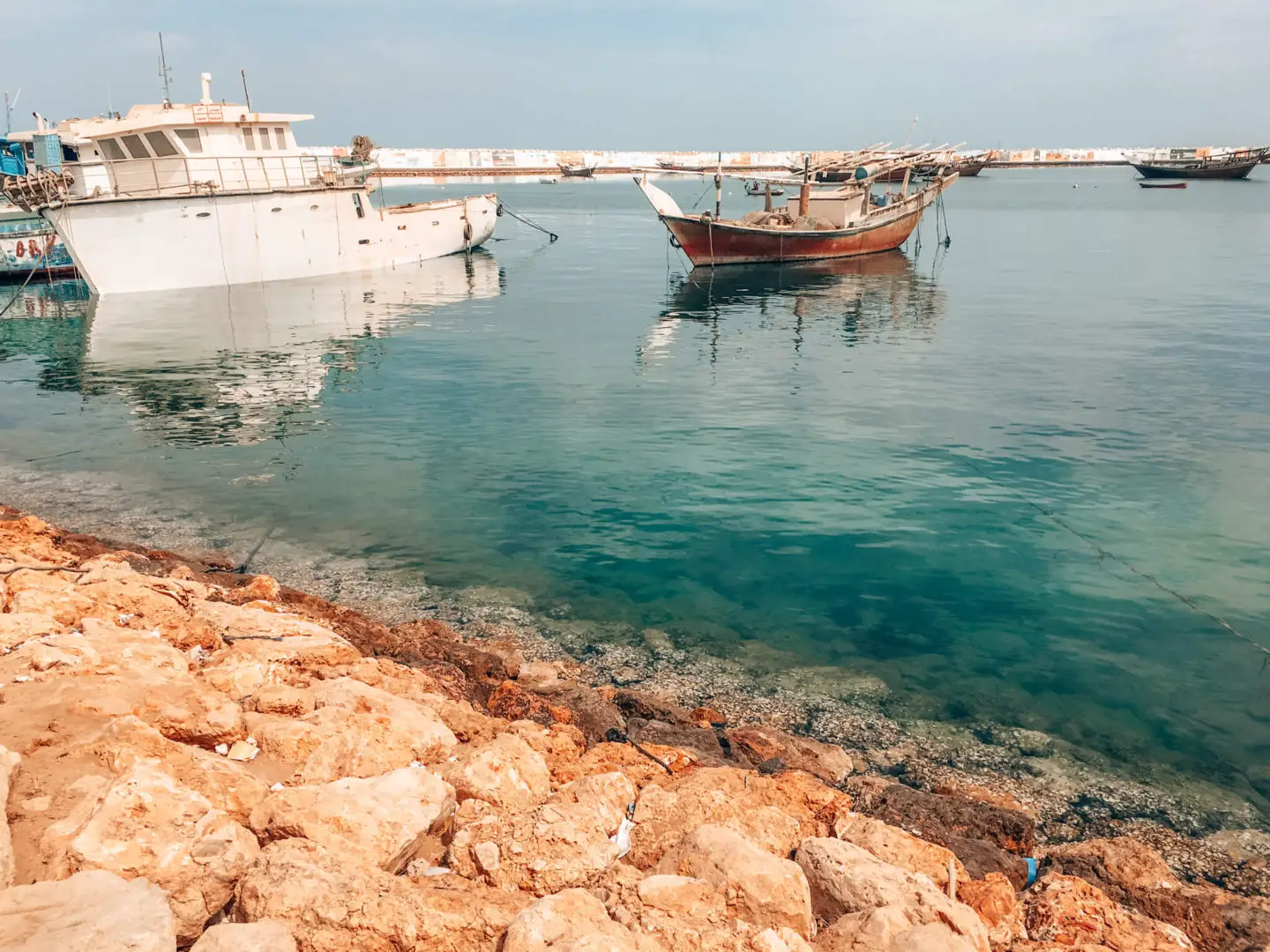Boats in the coastal town of Sur in Oman