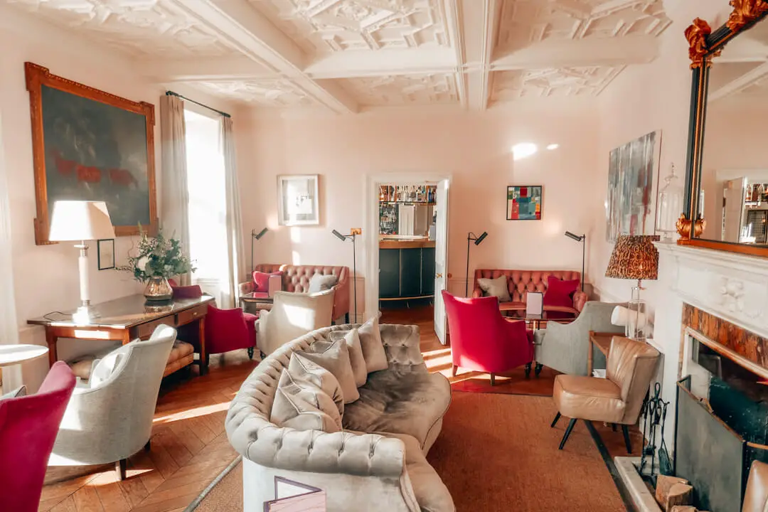 The Pink Lounge at Slaughters Manor House Hotel, a luxury boutique hotel in The Cotswolds