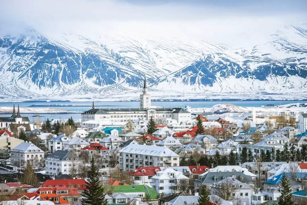 Reykjavik in Iceland in the snow against the mountain backdrops